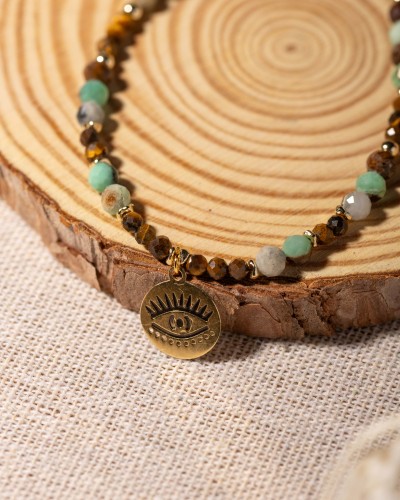 Bransoletka z naturalnego chryzoprazu i tygrysiego oka z symbolem oka to wyjątkowa biżuteria handmade w stylu boho, inspirowana intuicją, naturą i wewnętrzną siłą.